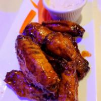 Crispy Chicken Wings · Choice of BBQ, Hoisin or Hot. Served with Blue Cheese Dressing.