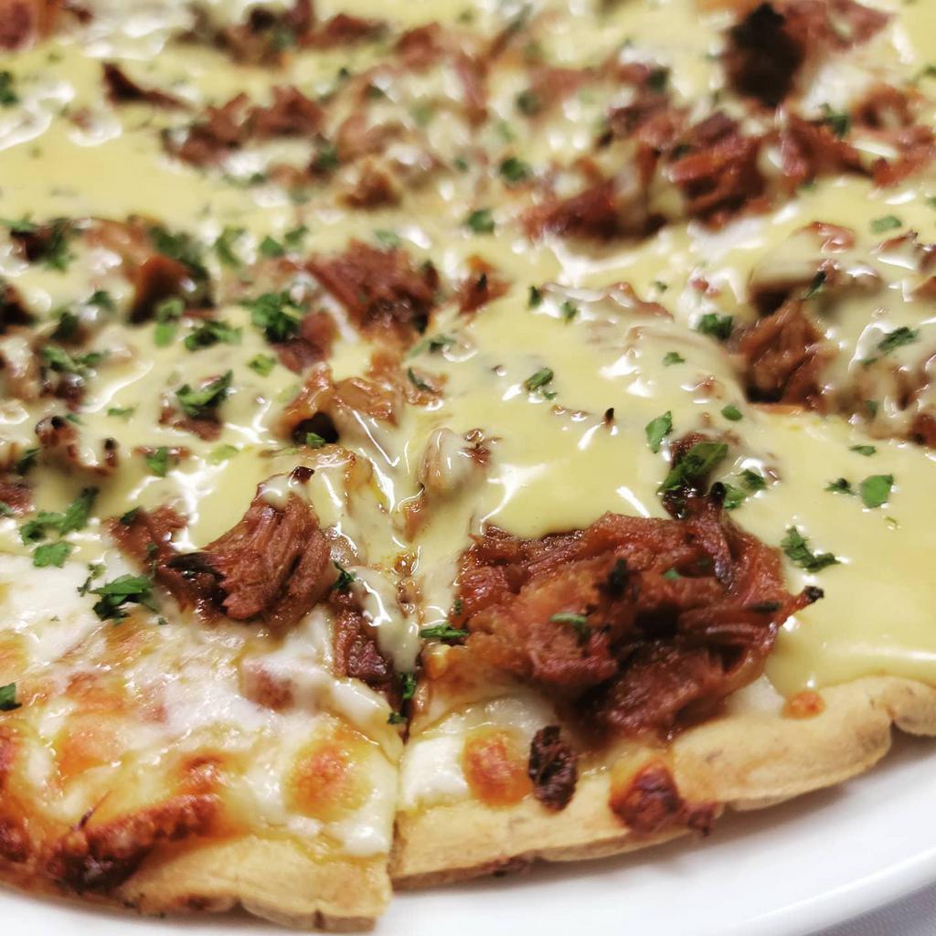 BBQ Brisket Pizza · Slow cooked beef brisket, sweet BBQ, cheddar cheese.