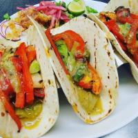 Veggie Tacos · Roasted Tomatillos, Roasted Jalapenos, Pickled Onions, Cotija Cheese, Pico De Gallo