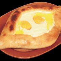 Khachapuri · A traditional Georgian dish of cheese filled bread. Bake with mozzarella and sprinkled with ...