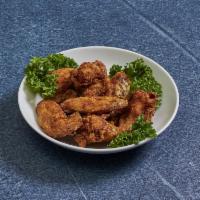 T9. Thai Wings · Marinated fried chicken served with sweet chill sauce. 