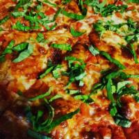 The Captain Pizza · Full flavor with a skinny waist. Sliced Roma tomatoes, fresh basil and mozzarella, pepperoni...
