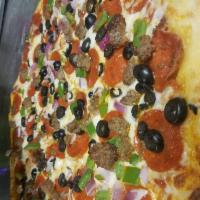 Supa Dupa Pizza · Pepperoni, ground sirloin, sweet red onions, bell peppers, mushrooms and black olives.