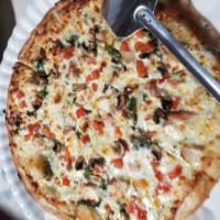 The Guido · Alfredo sauce, roasted garlic chicken, spinach, tomatoes and mushrooms