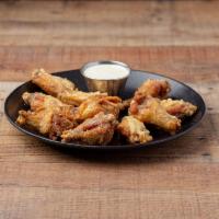 Jumbo Fresh Wings · Served with blue cheese and choice of sauce.