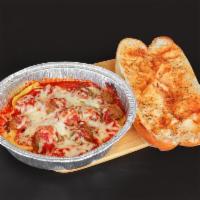 6 Cheese Ravioli with Meatballs · Served with garlic bread and small salad.