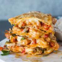 Q4. Shrimp Quesadilla · Shrimp, grilled onions & peppers, Jack cheese, kale, spinach, and sour cream.