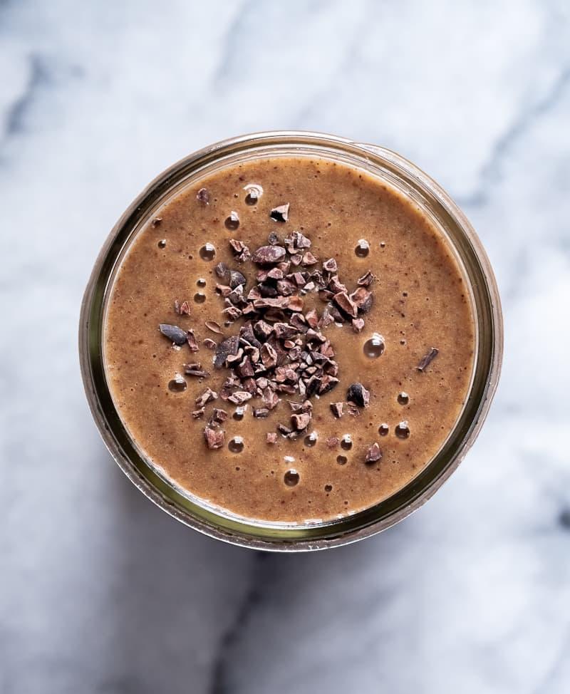 Maca Mocha Smoothie · Signature Macs Mocha blended with frozen banana and nut milk of your choice