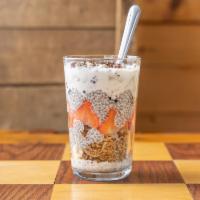 Portland Parfait · Housemade granola with chia pudding, coconut creme topped with fresh berries, cacao nibs and...