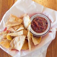 Chips and Salsa · Thinly sliced and crispy. Salsa made from tomatoes, chilis and onions. 