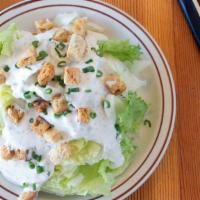 Iceburg Wedge · Housemade croutons, green onion, your choice of Podnah’s blue cheese, Thousand Island, ranch...