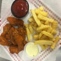 2. Ten Pieces Wings, Fries and Drink Combo Special · Cooked wing of a chicken coated in sauce or seasoning.