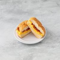 Bacon Egg Cheese on a roll · Crispy Bacon, Eggs, American Cheese on a Roll