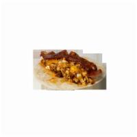 Bandito Signature Breakfast Taco · Contains Chorizo, scrambled eggs, seasoned potatoes, thick cut bacon, and cheddar cheese