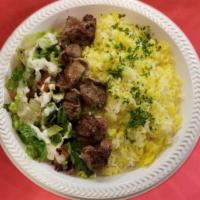 Lamb Kebab Plate · Marinated lamb kabab. Served with basmati rice and salad.