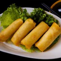 Traditional Crispy Spring Rolls · crispy fried rice paper wrapped rolls with pork, carrot, jicama, taro, and rice vermicelli, ...