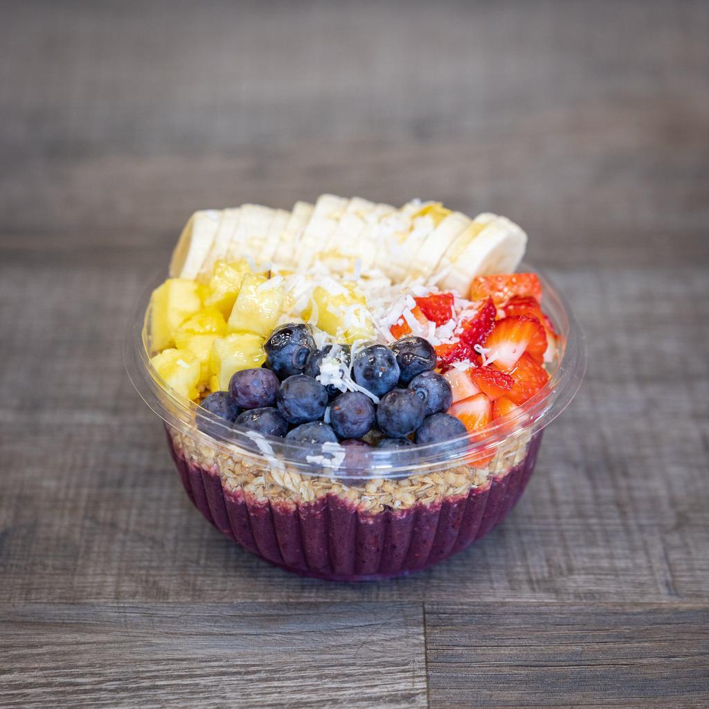 Acai Bowl · Topped with granola, strawberries, blueberries, banana, pineapple, coconut, and honey.