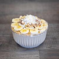 Almond Joy Bowl · Banana, coconut, and vanilla protein base topped with granola, banana, almonds, coconut, and...