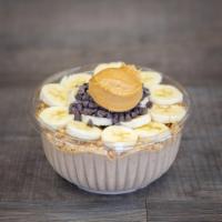 Reese's Cup Bowl · Banana, peanut butter, and chocolate protein base topped with granola, banana, powdered pean...