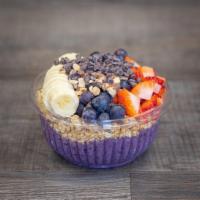 Blueberry Crunch Bowl · Blueberries, bananas, almond butter, whey protein, and cinnamon base. Topped with strawberri...