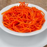 Spicy Carrot Salad · Traditional to the Korean cuisine it is made with shredded carrots, spices such as red and b...