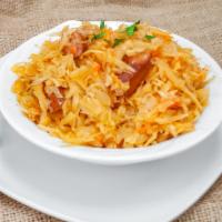 Bigos (Stewed Cabbage) · Traditional to the polish cuisine, it is made with stewed sauerkraut, cabbage and smoked meat.
