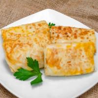 Meat Blintzes (4pc) · A thin crepe filled with sautéed chicken and beef.