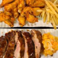 Wings / Baby Back Ribs Ribs · A dozen of jumbo chicken wings and half of rack of Baby Back Ribs, served with fries & cauli...
