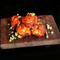 Cauliflower Wings · Flash fried, coated with sweet and spicy sauce.