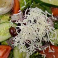Greek Salad · Butter lettuce, olives, cucumber, feta, tomato and red onion, dressed with extra virgin oliv...