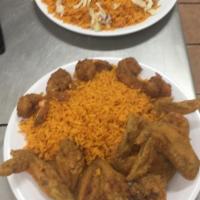 Combo 1 · 3 wings, 2 pieces fish, and choice of side (French fries or Rice). & can of soda