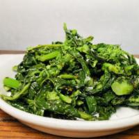 Broccoli Rabe · Chili flake and olive oil.