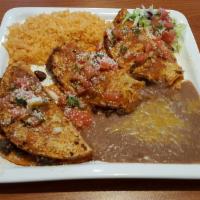Tacos al Carbon · 3 corn tortillas with your choice of steak or chicken dipped in our special salsa, Mexican c...