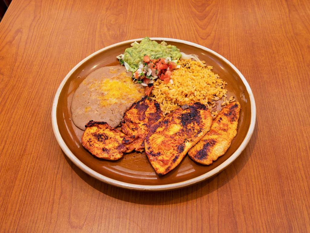 Pollo Adobado · A marinated boneless skinless chicken breast roasted on authentic Mexican spices.
