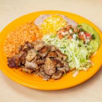 13. Carnitas Plate · Shredded pork, lettuce, pico de gallo and guacamole. Rice and beans with cheese on the side....