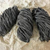 Black Squid Ink · Tagliolini. Fresh egg pasta noodles 12oz prepacked containers includes three main course ser...