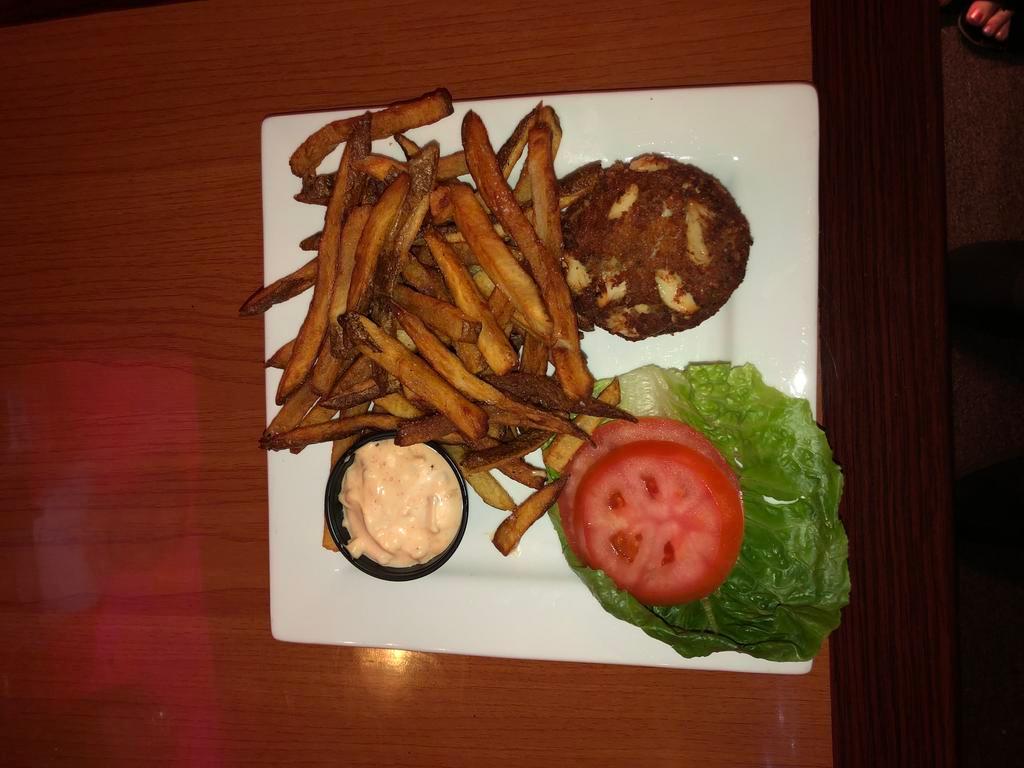 Crab Cake Sandwich · Jumbo lump crab cake, lettuce, tomato, tartar sauce.