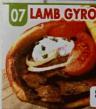 07. Lamb Gyro Sandwich · Cooked on a spit and wrapped in a pita. 