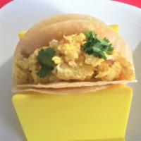 Taco Breakfast · 1 taco with double corn or flour tortilla, scrambled  egg, and 1 add on. 