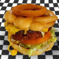 Special Aleida's Burger · 1 beef meat, 1 fried chicken, double yellow cheese, pickles, bacon, lettuce, tomato, 1 onion...
