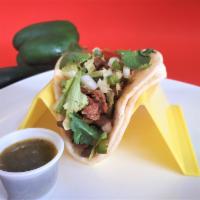Taco Fajita  · 1 taco with double corn or flour tortillas, 1 meat (fajita beef or fajita chicken), onion, a...