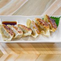 Dumplings · Served with choice of miso soup, salad or rice.