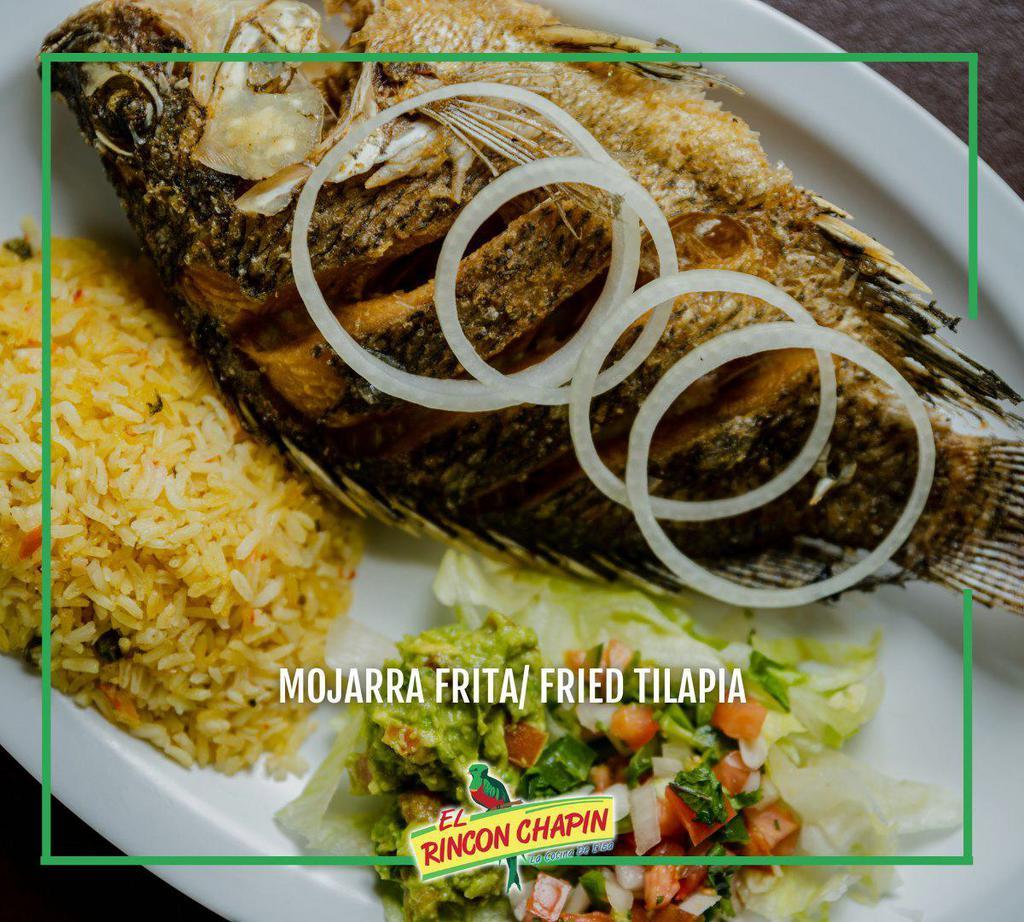 Mojarra Frita · A whole fried and seasoned tilapia accompanied by rice or French fries, pico and guacamole.