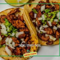 Street Tacos · Traditional tacos with double tortilla, asada, chicken, pastor and tripe.