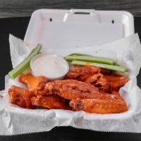 Wings · Our wings are fresh and juicy. Served with celery and bleu cheese. Your choice of mild, hot,...