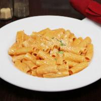 Rigatoni Vodka Dinner · Rigatoni in a pink vodka cream sauce with prosciutto. Served with soup or salad. 