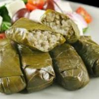 Stuffed Grape Leaves · 6 pieces. Served with feta, cheese, lettuce and tomato.