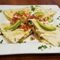 Quesadilla · Comes with pepper, onion, tomato, cheddar cheese. Served with sour cream and salsa.