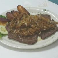 41. Steak Sauteed with Onions · Served with rice, beans, salad and sweet plantain.