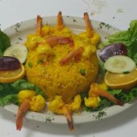 54. Rice with Shrimp · Served with salad and french fries.
